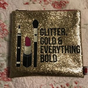 Gold makeup bag